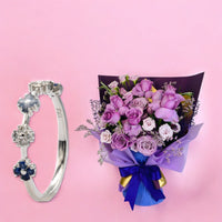 Blossom Quartet Diamond Ring in White Gold & Flower Arrangement